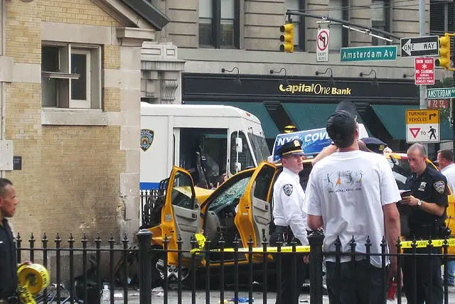 Because what you want to see when you're heading to the subway station is a taxi crashed into the head house.
